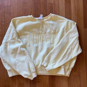 Yellow sweatshirt over sized